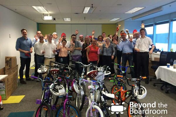 Suncorp team with the bikes they built